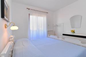 Postel nebo postele na pokoji v ubytování House Pula 2080