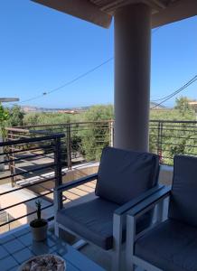 A balcony or terrace at Gianna's Villa Gialova