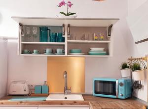 Küche/Küchenzeile in der Unterkunft Benal-beach Marina Deluxe