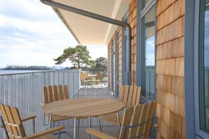 Balkón nebo terasa v ubytování ÅhusBrygga Apartment Hotel