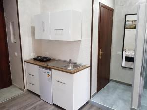 Kuchyňa alebo kuchynka v ubytovaní Napoli central