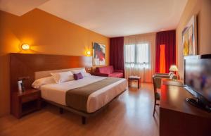 Postel nebo postele na pokoji v ubytování Hotel Andia