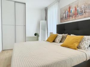 Postel nebo postele na pokoji v ubytování Apartments Antons