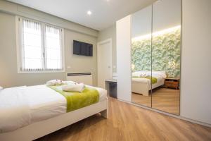 Uma cama ou camas num quarto em Truly Verona