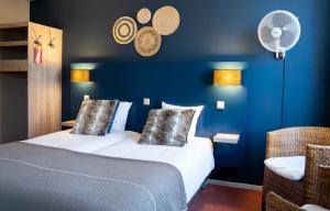 Postel nebo postele na pokoji v ubytování Hotel Villa Flora