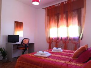 Postel nebo postele na pokoji v ubytování B&B Arcobaleno