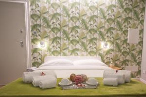 Uma cama ou camas num quarto em Truly Verona