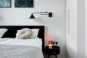 Posteľ alebo postele v izbe v ubytovaní Elite Apartments Garden Gates Premium