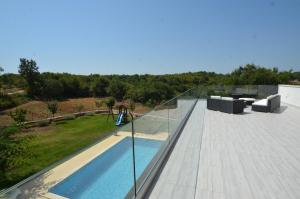 Bazén v ubytovaní Villa Margherita alebo v jeho blízkosti