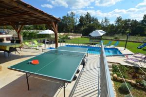 Stolní tenis v ubytování Villa Margherita nebo okolí