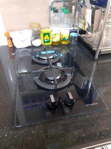 a stove top oven sitting on a counter top at Apartamento con wifi in Nador +15 photos