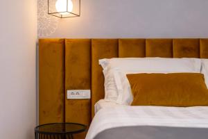 Posteľ alebo postele v izbe v ubytovaní Luxury rooms Spalatum