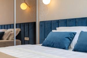 Posteľ alebo postele v izbe v ubytovaní Luxury rooms Spalatum