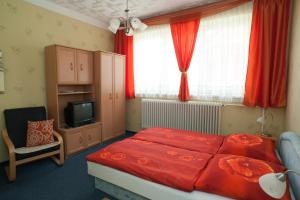 Posteľ alebo postele v izbe v ubytovaní Oleander Apartman