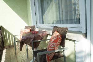 Posedenie v ubytovaní Oleander Apartman