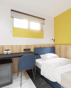 A bed or beds in a room at Dovzhenko
