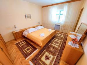 Postel nebo postele na pokoji v ubytování Apartment Big Lasan