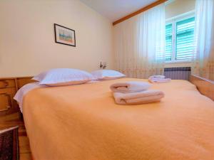 Postel nebo postele na pokoji v ubytování Apartment Big Lasan