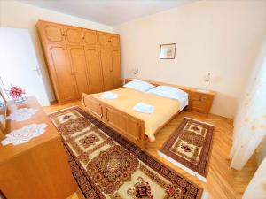 Postel nebo postele na pokoji v ubytování Apartment Big Lasan