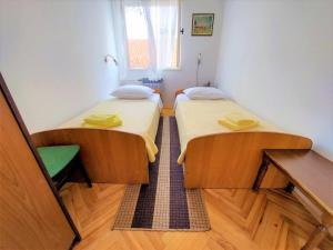 Postel nebo postele na pokoji v ubytování Apartment Big Lasan