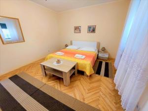 Postel nebo postele na pokoji v ubytování Apartment Big Lasan
