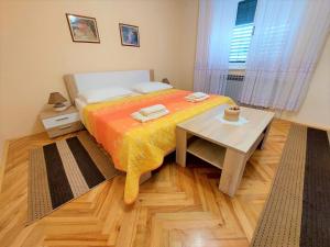 Postel nebo postele na pokoji v ubytování Apartment Big Lasan