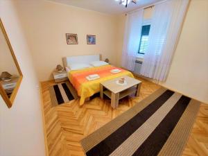 Postel nebo postele na pokoji v ubytování Apartment Big Lasan
