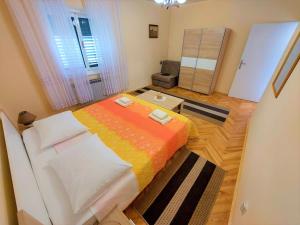 Postel nebo postele na pokoji v ubytování Apartment Big Lasan