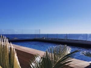 a large body of water with a view of the ocean at Hotel Port Toga in Bastia