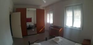 Posteľ alebo postele v izbe v ubytovaní Camere ed Appartamenti in centro a Bergamo