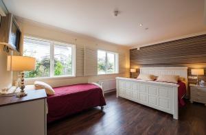 Postel nebo postele na pokoji v ubytování Sea Breeze Lodge B&B Galway