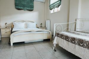 Posteľ alebo postele v izbe v ubytovaní Villa Milena