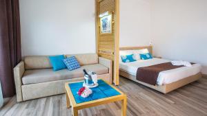 Voodi või voodid majutusasutuse Baia di Conte Resort toas