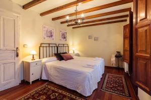 En eller flere senge i et værelse på Casa Rosaura