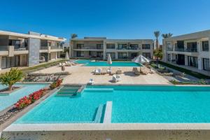 Bazén v ubytování Cozy Studio in G-Cribs with pool - Golden Apartments El Gouna nebo v jeho okolí