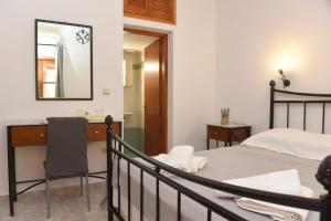 A bed or beds in a room at Laxesis