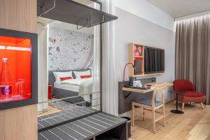 Postel nebo postele na pokoji v ubytování IntercityHotel Budapest