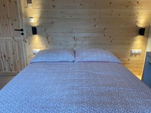 Posteľ alebo postele v izbe v ubytovaní Drevenica Humno