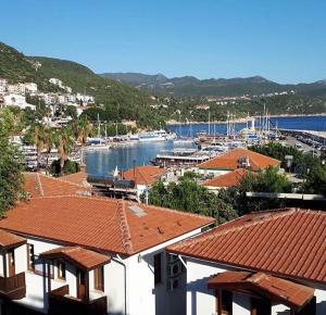 a view of a marina with boats in the water at Hotel Nisa in Kaş