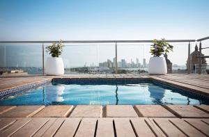 a swimming pool on the roof of a building at Blue Diamond Club at Movich Cartagena in Cartagena de Indias