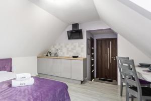 Postel nebo postele na pokoji v ubytování Pokoje, Noclegi, Apartamenty Dune Resort Łeba