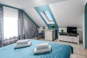 Postel nebo postele na pokoji v ubytování Pokoje, Noclegi, Apartamenty Dune Resort Łeba