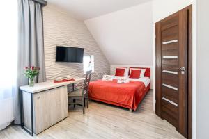 Postel nebo postele na pokoji v ubytování Pokoje, Noclegi, Apartamenty Dune Resort Łeba