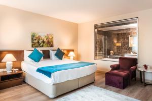 Ένα ή περισσότερα κρεβάτια σε δωμάτιο στο Rox Hotel Istanbul +54 φωτογραφίες