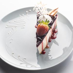 a piece of cake sitting on a white plate at برج الذهبية للشقق المخدومة in Taif +18 photos