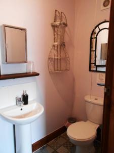 Ένα μπάνιο στο Shore Stay Guest House