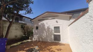 a side view of a white building with a window at orlando in Porto Garibaldi