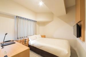 TV a/nebo společenská místnost v ubytování Nesthotel alt Kuramae Station