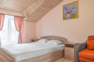 Postel nebo postele na pokoji v ubytování Flamingo Family Club