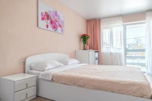 Postel nebo postele na pokoji v ubytování Flamingo Family Club